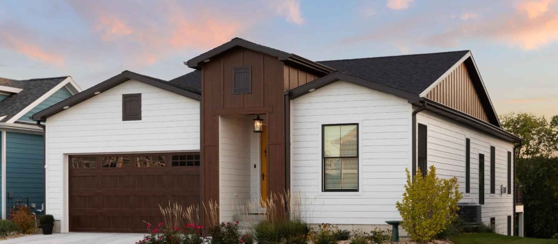 A house with a royal vinyl board and batten siding.